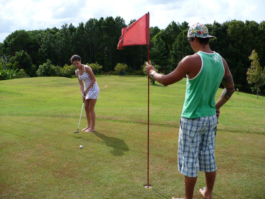 playing golf